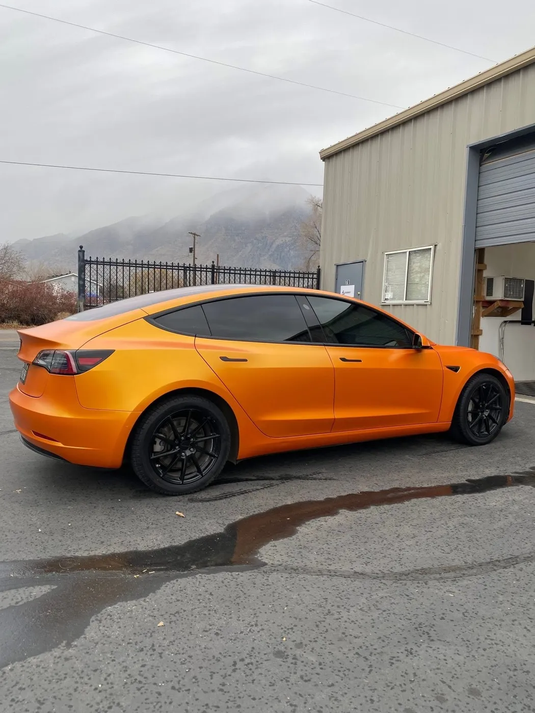 Satin orange Tesla Model 3 color change wrap by Summit Wraps Utah